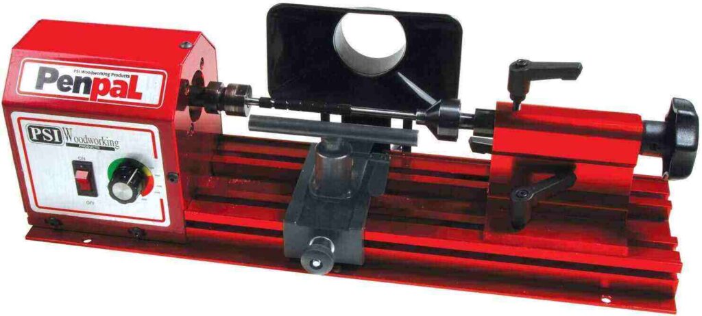 "Dark red colored PSI woodworking penpal mini wood lathe in a white background"