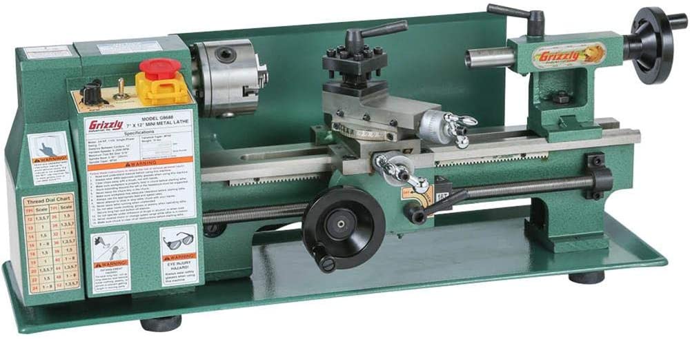 "Olive green colored Grizzly G8688 Mini Metal Lathe in a white background"