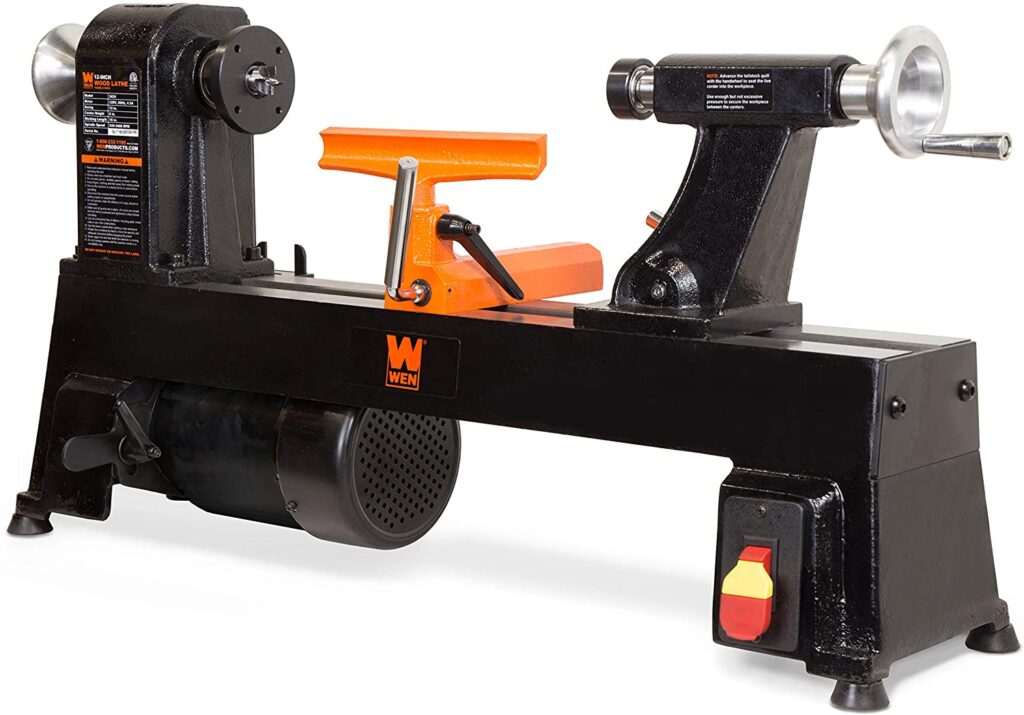 "3424T Midi wood lathe in a Black Colored body with orange tool rest in a white background"