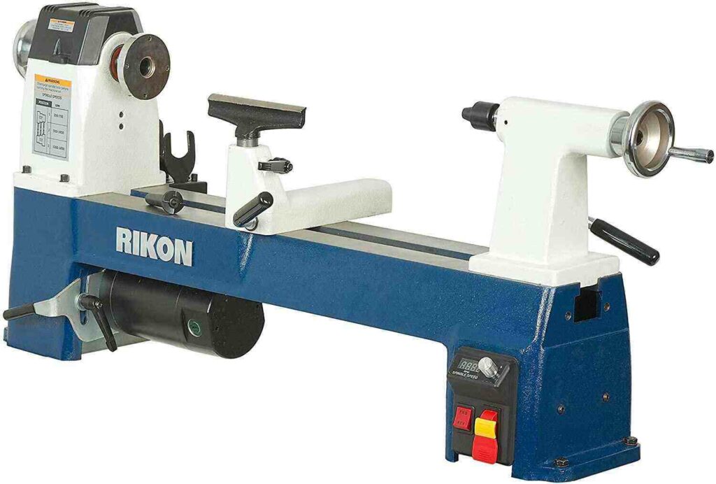 "Rikon 70-220vst midi lathe in Blue bed with white tailstock, headstock and tool rest"