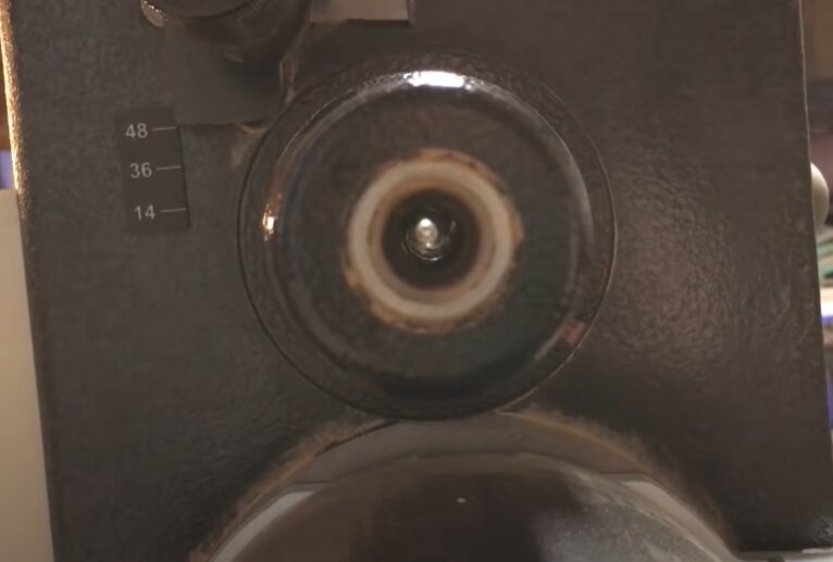 "Spindle whole of a black wood lathe machine"