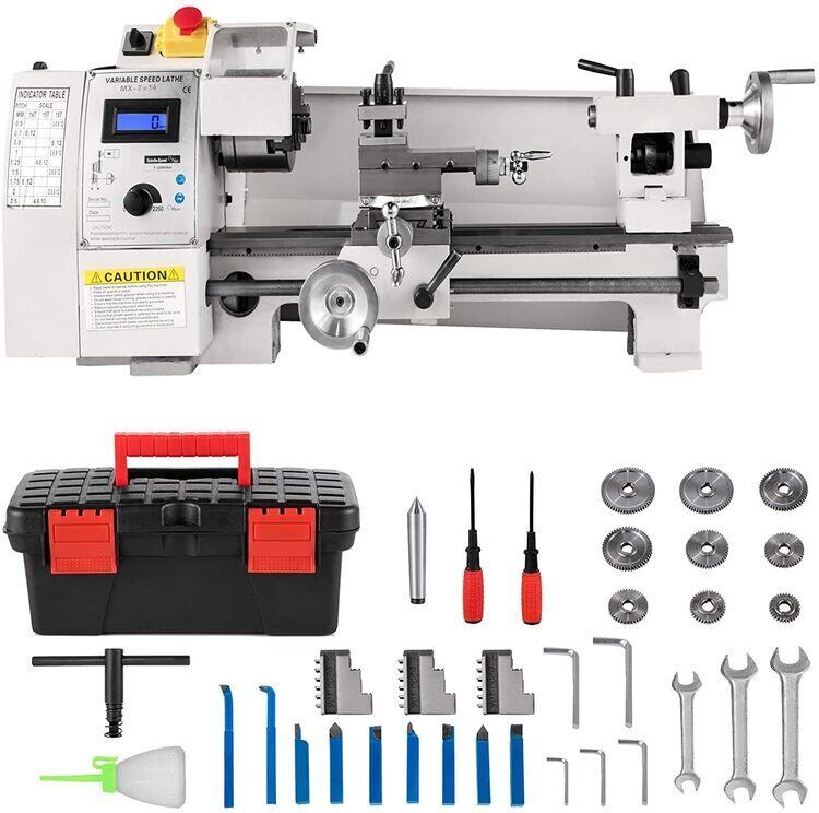 Vevor mini metal lathe with different parts and tools in a white background